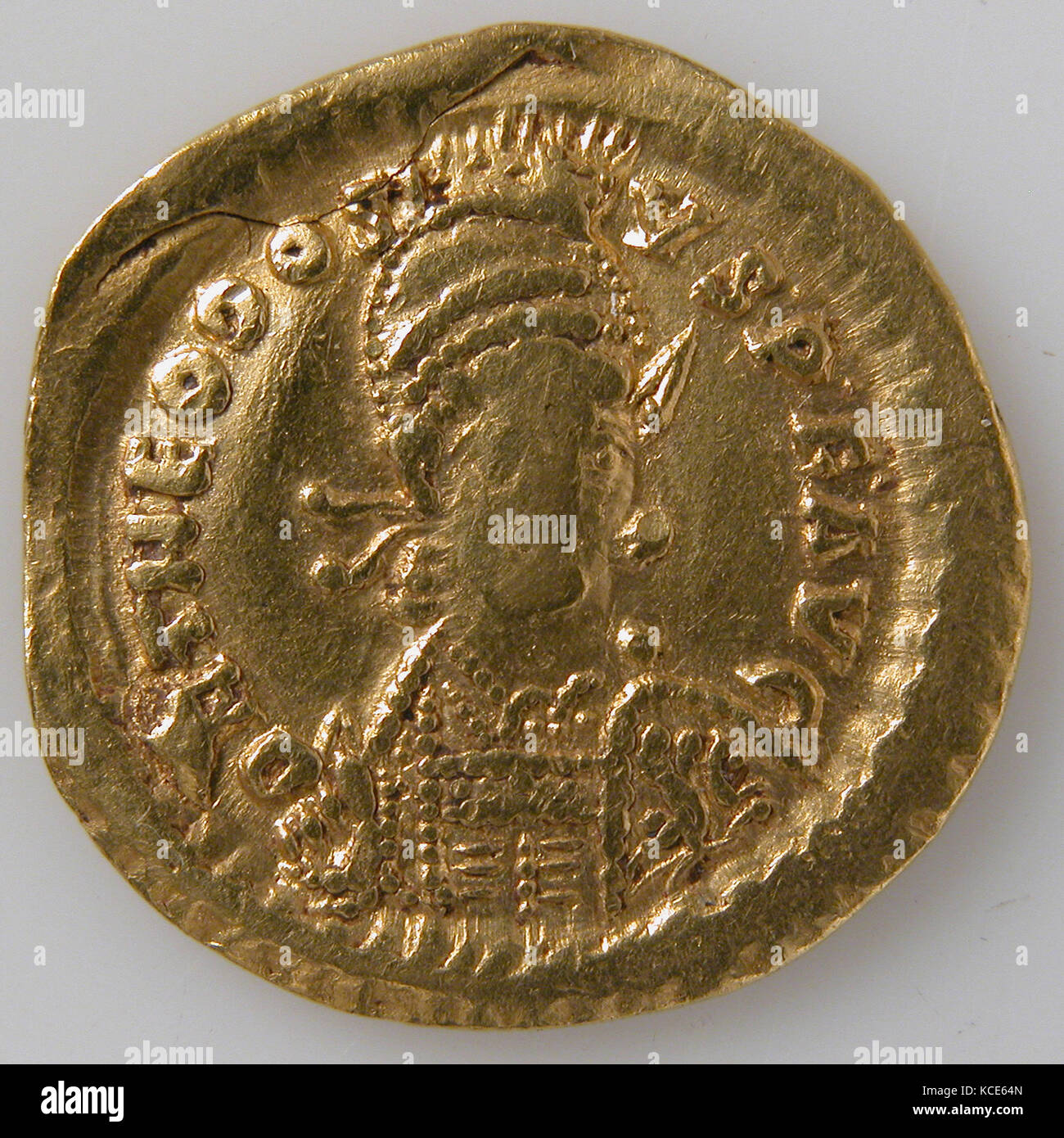 Solidus, 408–518, Made in Constantinople, Byzantine, Gold, Overall: 13/16 x 1/16 in. (2 x 0.1 cm), Coins Stock Photo