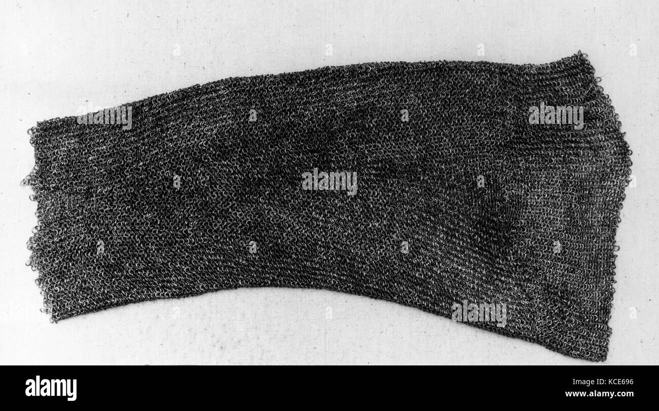 Sleeve of Mail, 16th century, German, Steel, L. 18 1/2 in. (47.0 cm); W. 7 7/8 in. (20.0 cm); Diam. (outside) of links 3/16 in Stock Photo