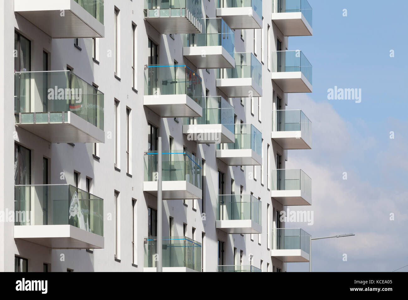 Exterior view of balconies of an apartment building as part of the Greenwich Peninsula Redevelopment, London, UK. Stock Photo