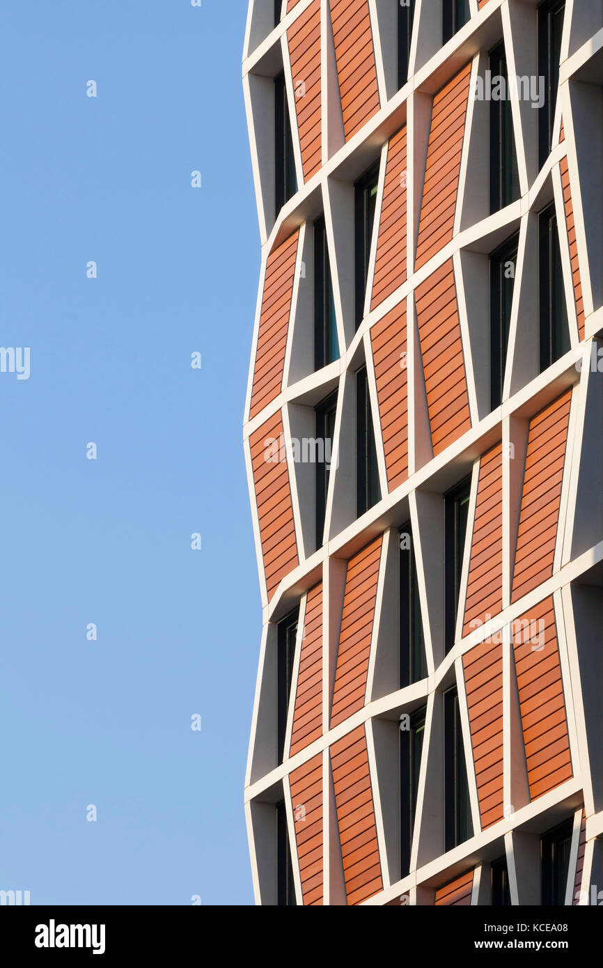 Patterns formed from the windows and cladding on the facade of student accommodation in London. The structure comprises a reinforced concrete frame wi Stock Photo