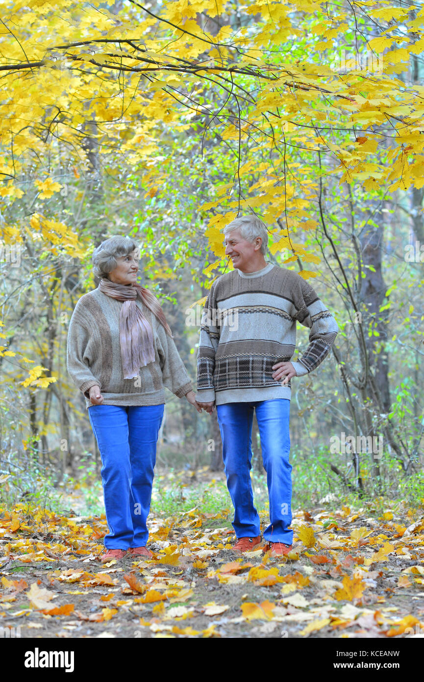 couple walking in the park Stock Photo - Alamy