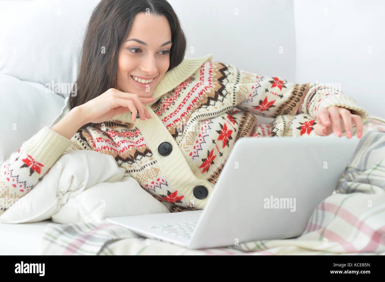 young woman using laptop Stock Photo - Alamy