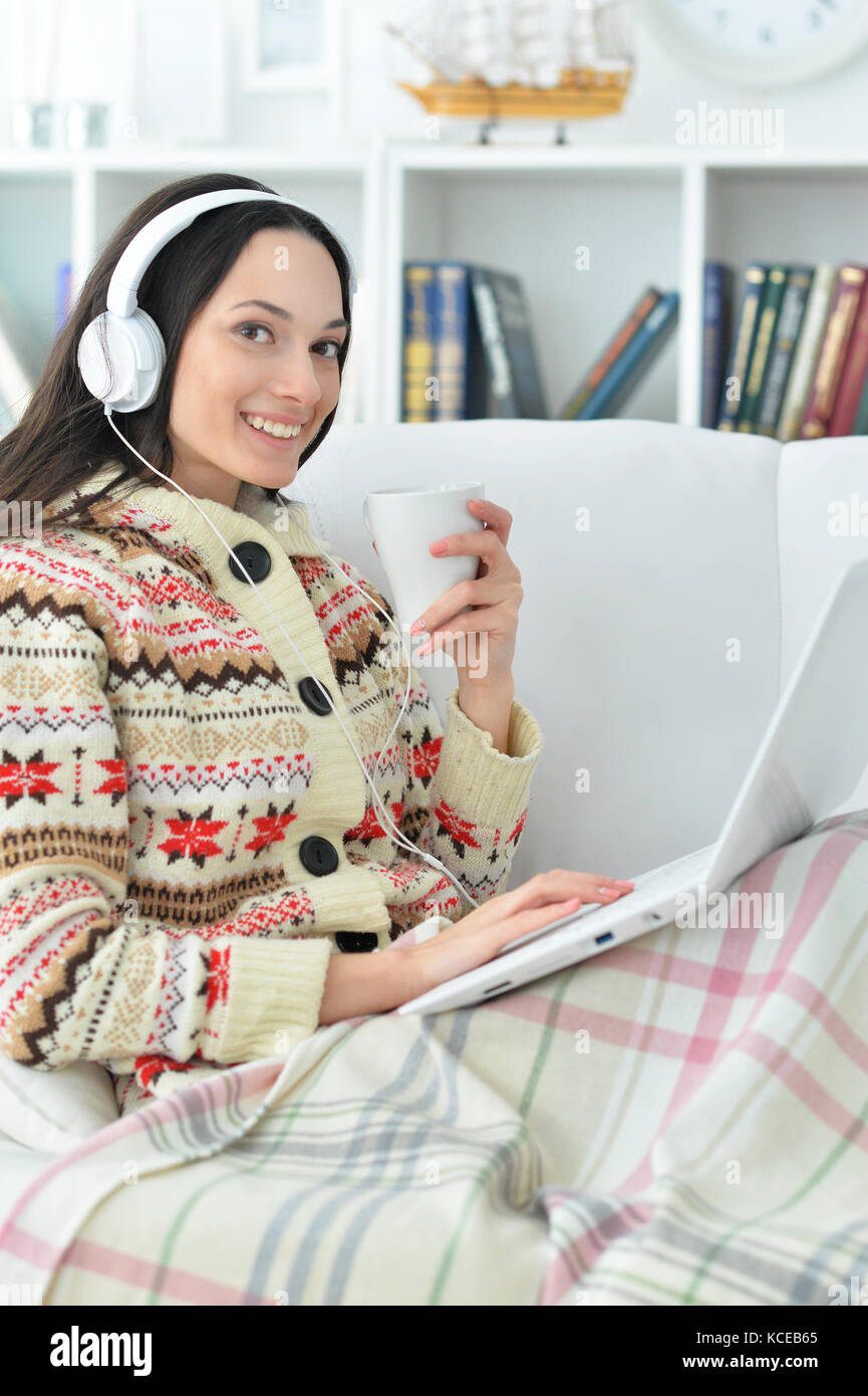young woman using laptop Stock Photo - Alamy