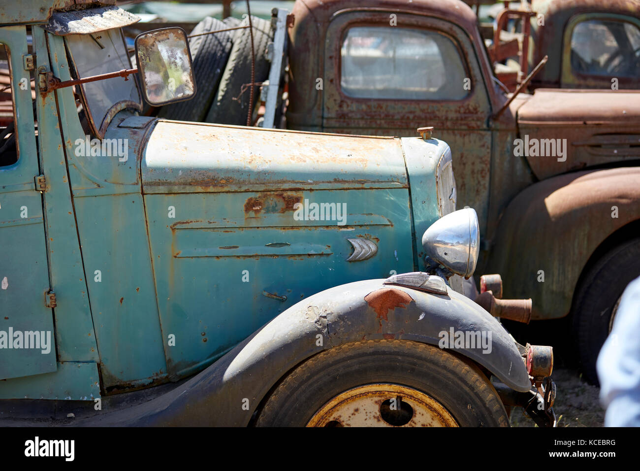 Old rusty green truck at a scrap yard Stock Photo - Alamy
