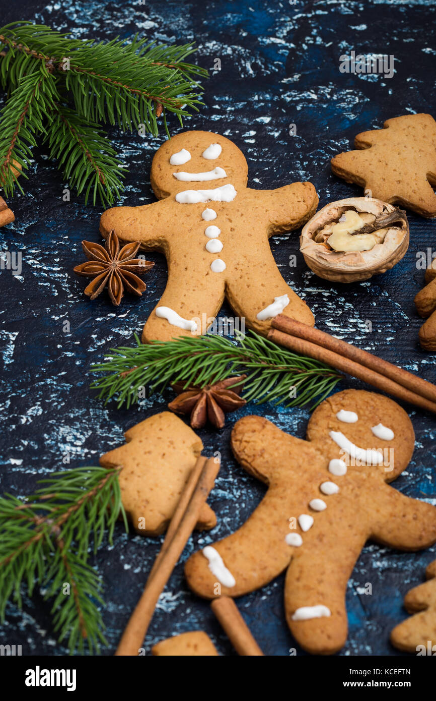 Gingerbread man and christmas tree , holiday cookies  background viewed from above Stock Photo