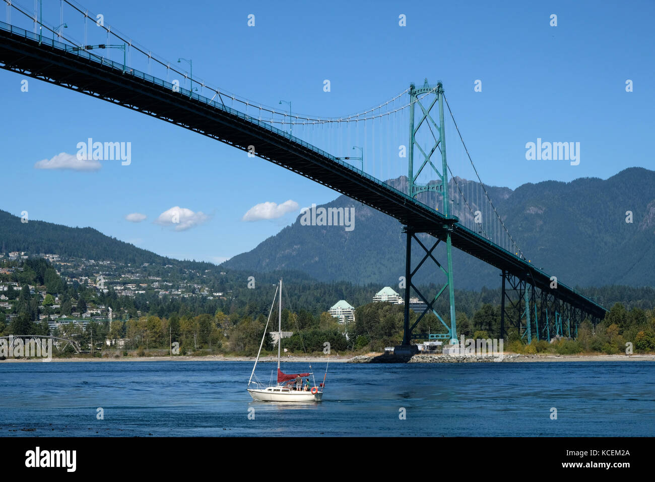 The Lions Gate Bridge across the narrows of Burrard Inlet in Vancouver, British Columbia, Canada. The bridge opened in 1938 and connects the City of V Stock Photo