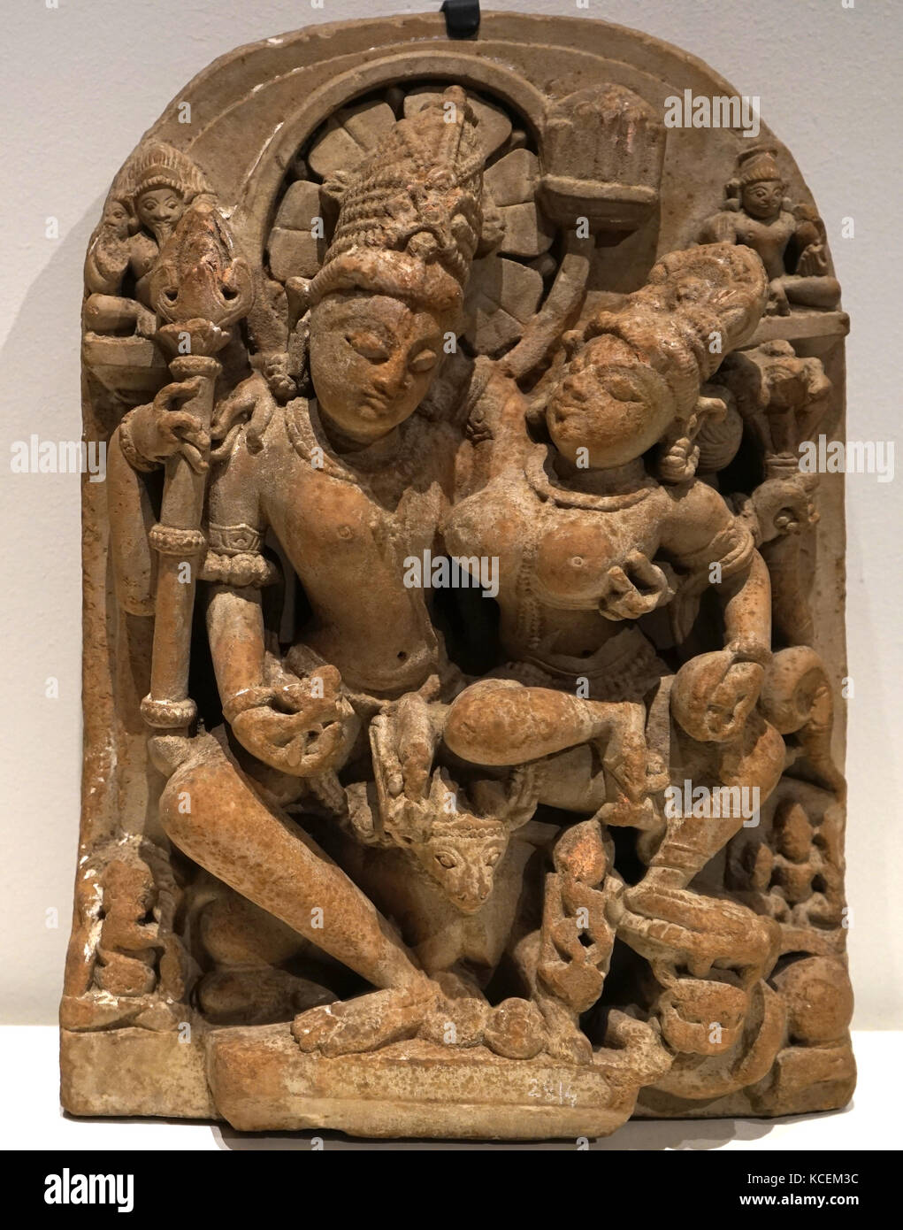 Statue depicting Shiva and Parvati. Shiva is known as the God of Creation, Destruction, Regeneration, Meditation, Arts, Yoga and Moksha. Parvati is known as the goddess of fertility, love and devotion; as well as of divine strength and power. Dated 12th Century Stock Photo