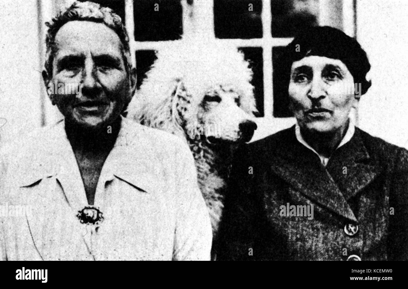 Gertrude stein (left and Alice B. Toklas. Gertrude Stein (1874 – 1946) was an American novelist, poet, playwright, and art collector. Toklas (1877 – 1967) was an American-born member of the Parisian avant-garde of the early 20th century, and the life partner of American writer Gertrude Stein Stock Photo