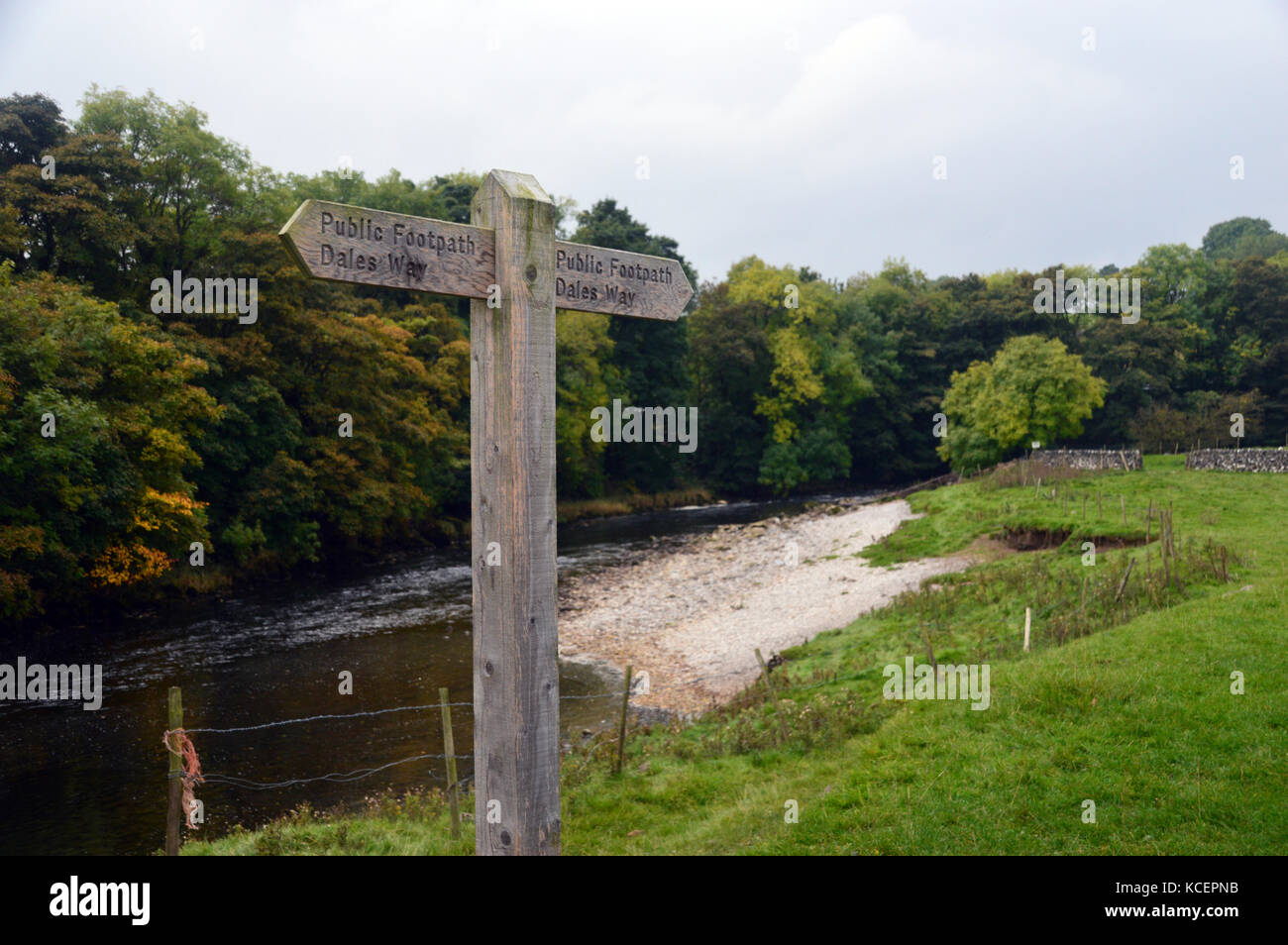 Wooden Signpost for the Dales Way Footpath Between Grassington & Burnsell in Wharfedale, Yorkshire Dales National Park, England, UK. Stock Photo