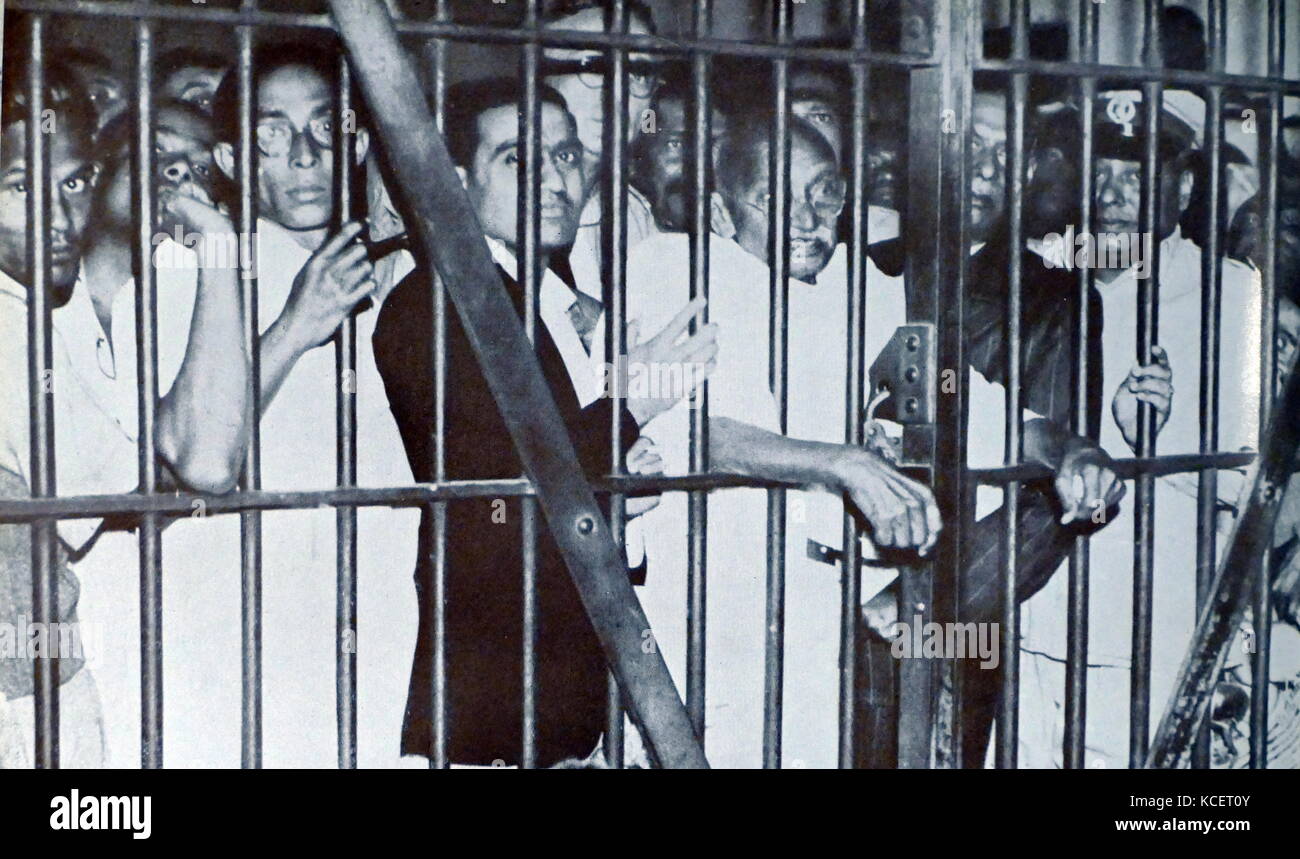 Mohandas Karamchand Gandhi visits political prisoners in Gaol, 1946. Gandhi (2 October 1869 – 30 January 1948), was the preeminent leader of the Indian independence movement in British-ruled India. Stock Photo