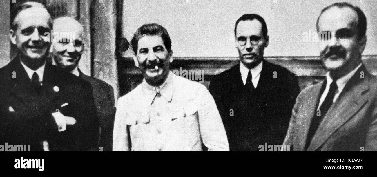 Stalin, Ribbentrop and Molotov after signing the Molotov–Ribbentrop Pact, (Nazi-Soviet Pact; German–Soviet Non-aggression Pact) 1939 was a treaty of non-aggression between Nazi Germany and the Union of Soviet Socialist Republics), signed in Moscow on 23 August 1939 by foreign ministers Joachim von Ribbentrop and Vyacheslav Molotov. Stock Photo