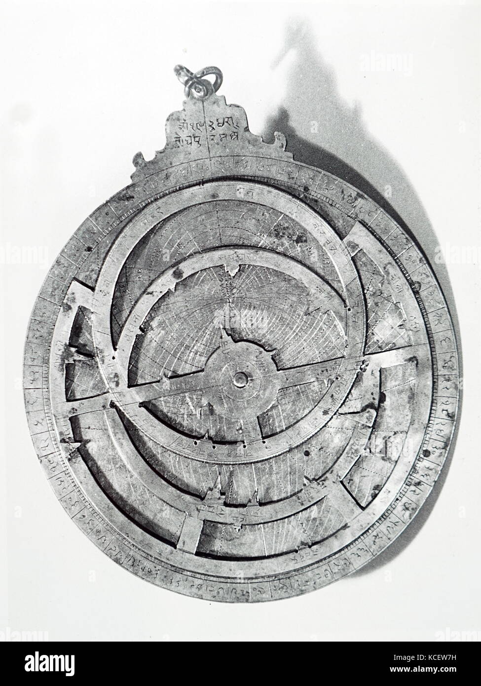 View of the front of a brass astrolabe. An astrolabe is an elaborate inclinometer, used by astronomers and navigators, to measure the inclined position in the sky of a celestial body, day or night. Dated 19th Century Stock Photo