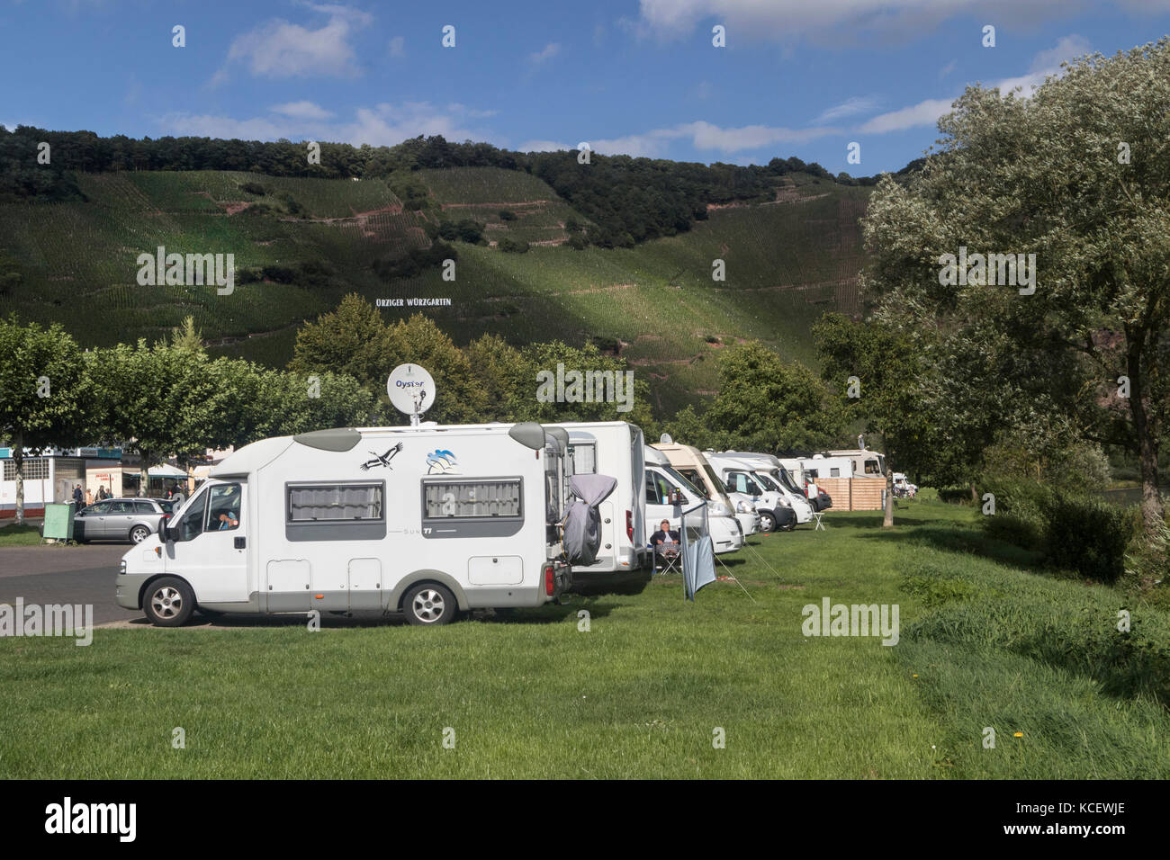 Camper vans in the town of Urzig, in the Mosel Valley, Germany Stock Photo