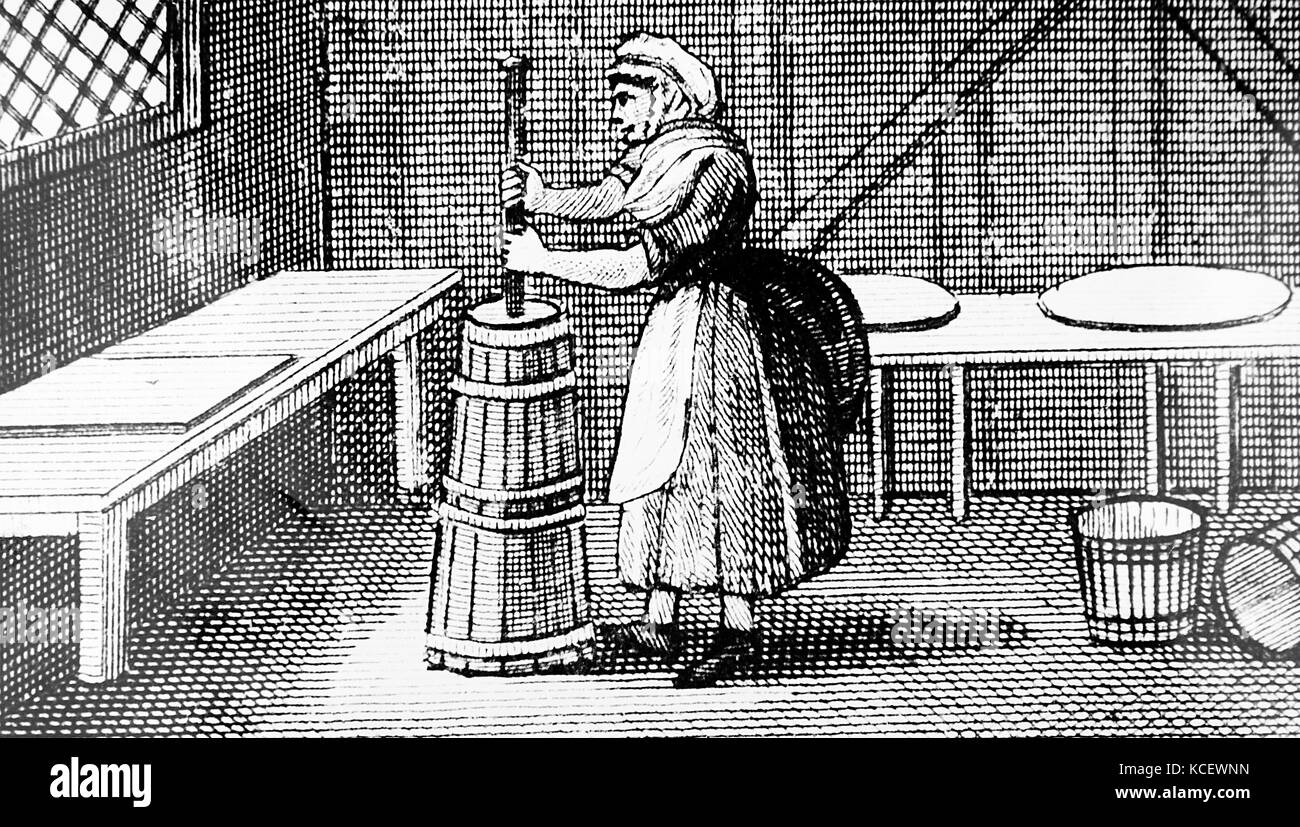 Engraving depicting a dairy and dairymaid using a piston churn. Dated 18th Century Stock Photo