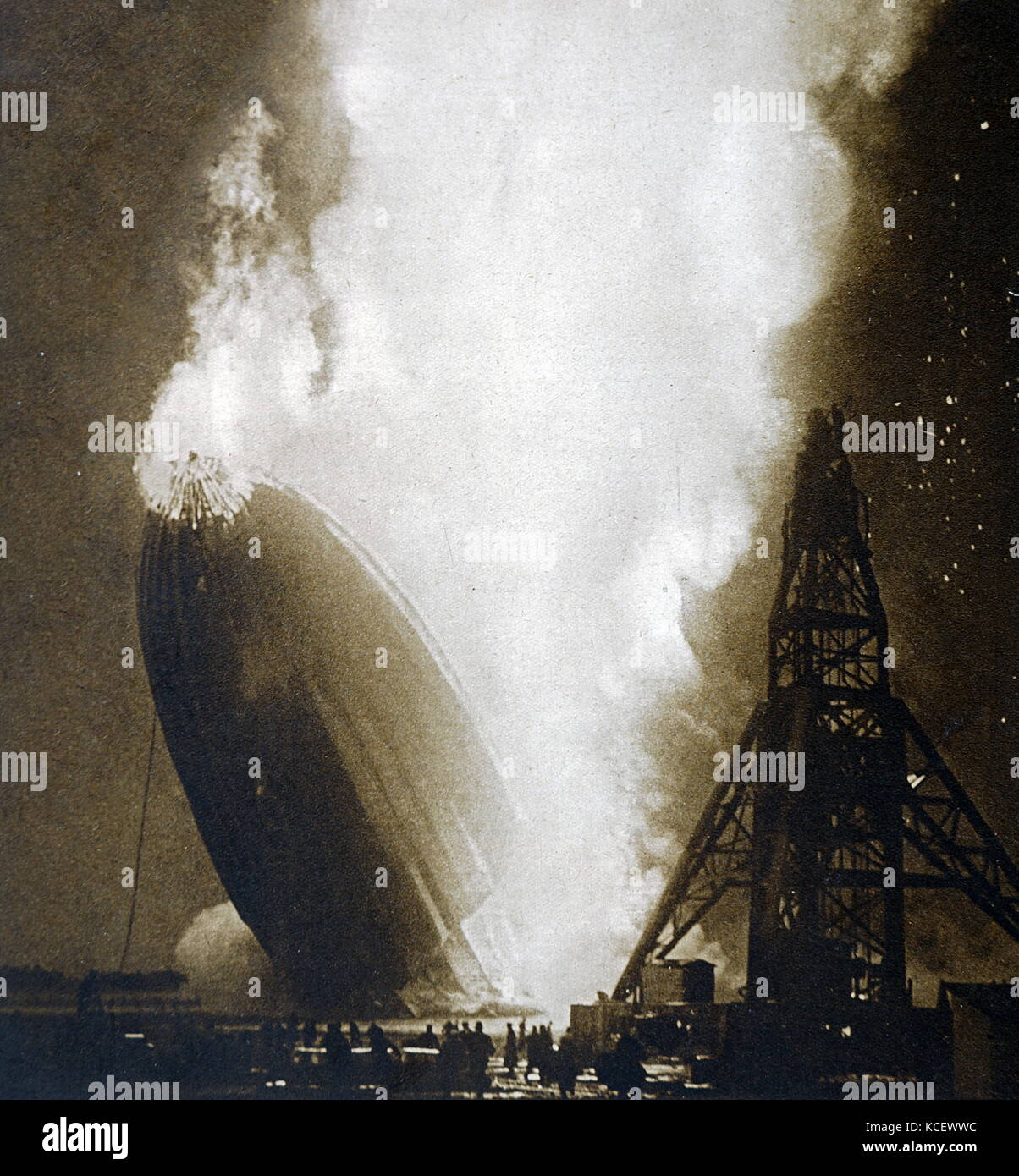 Photograph taken during the Hindenburg disaster. A German passenger airship LZ 129 Hindenburg caught fire and was destroyed whilst attempting to dock at the Naval Air Station Lakehurst. Dated 20th Century Stock Photo