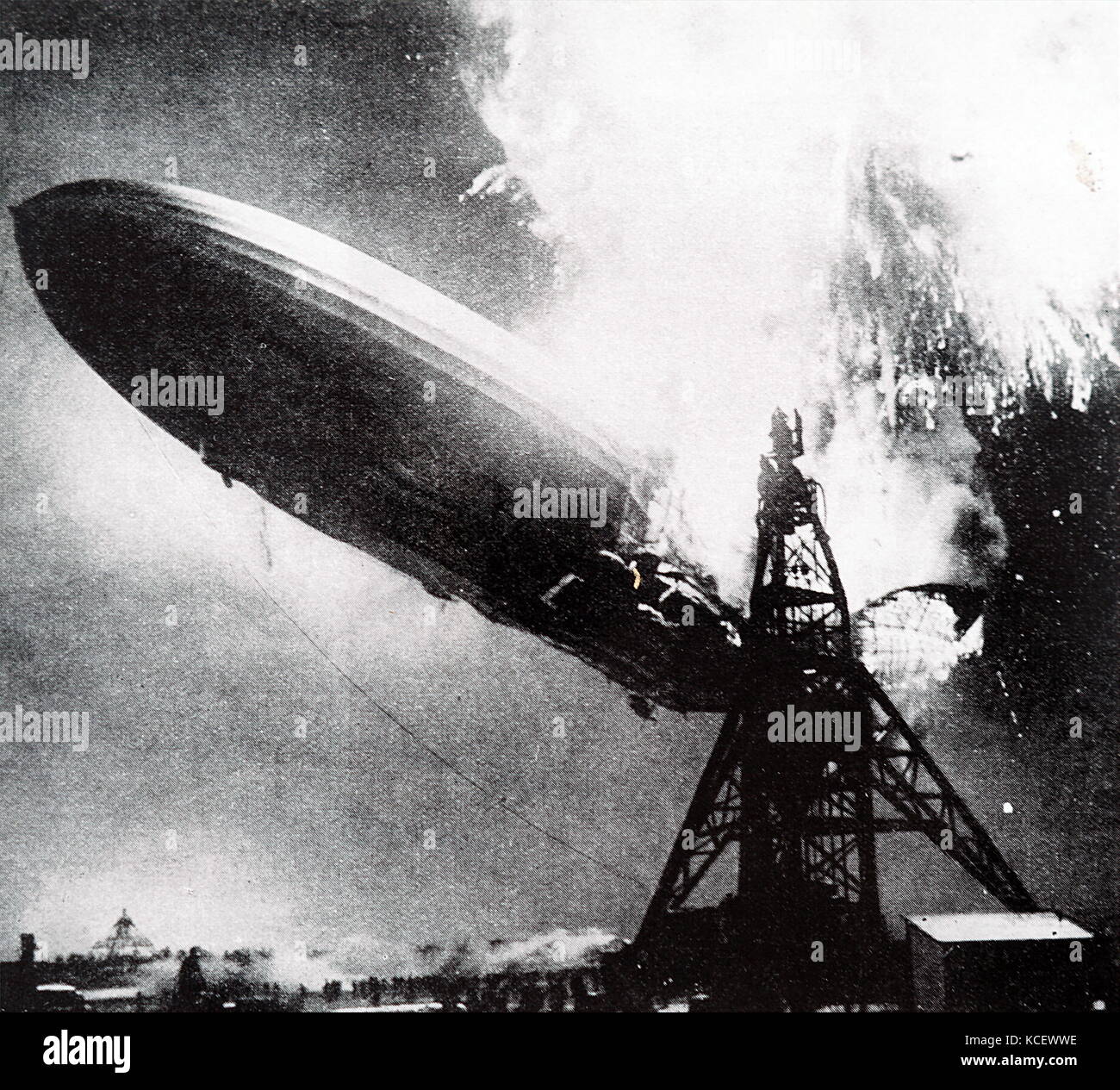 Photograph taken during the Hindenburg disaster. A German passenger airship LZ 129 Hindenburg caught fire and was destroyed whilst attempting to dock at the Naval Air Station Lakehurst. Dated 20th Century Stock Photo