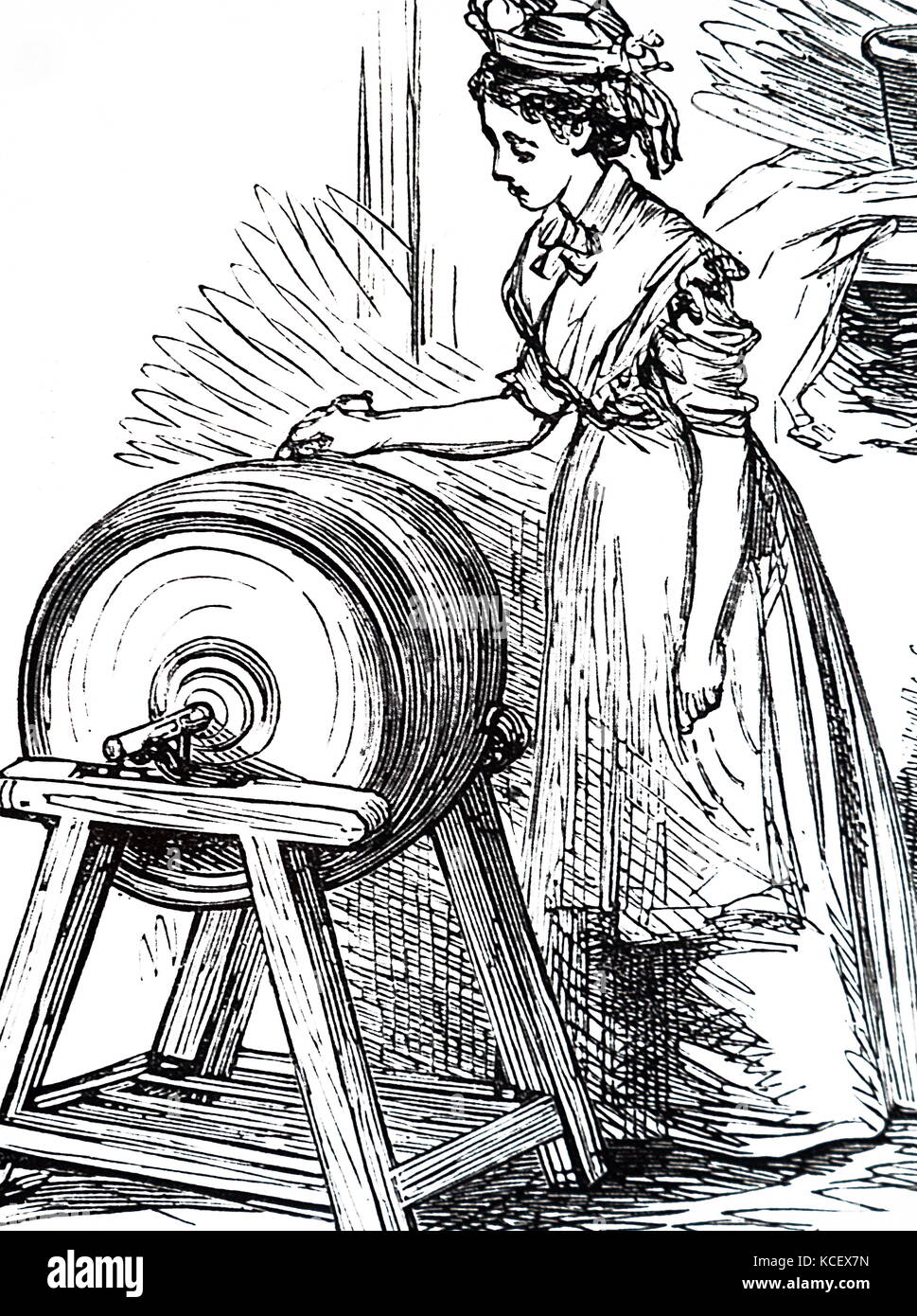 Engraving depicting a butter maid churning butter. Dated 19th Century Stock Photo