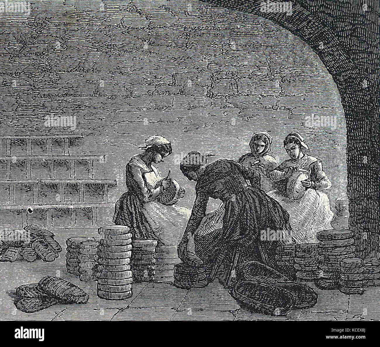 Engraving depicting women scraping cheese in the caves at Roquefort in France. Dated 19th Century Stock Photo