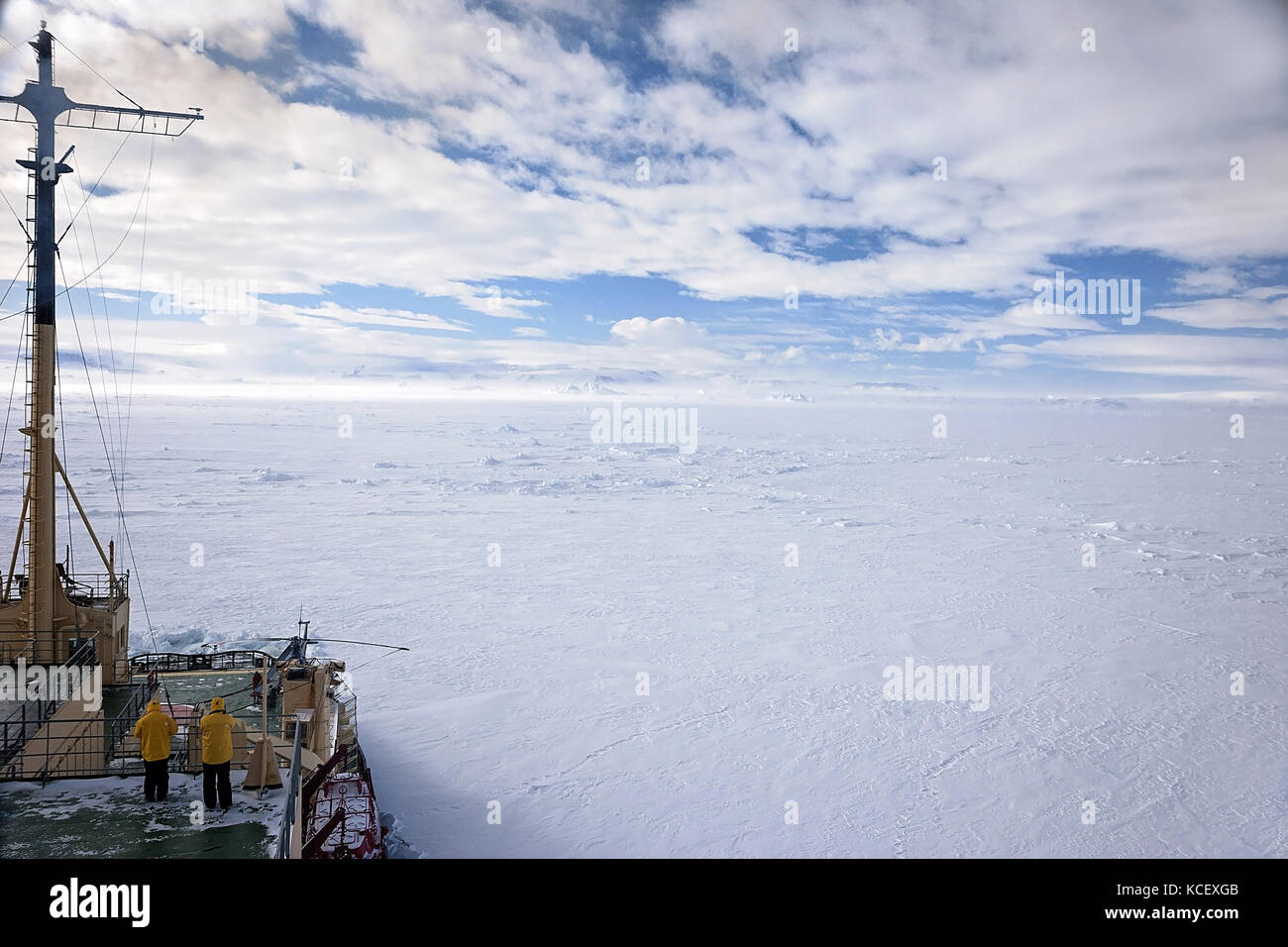 Icebreaker ploughing through ice in Antarctica on route to emperor penguin colony at Snow Hill Stock Photo