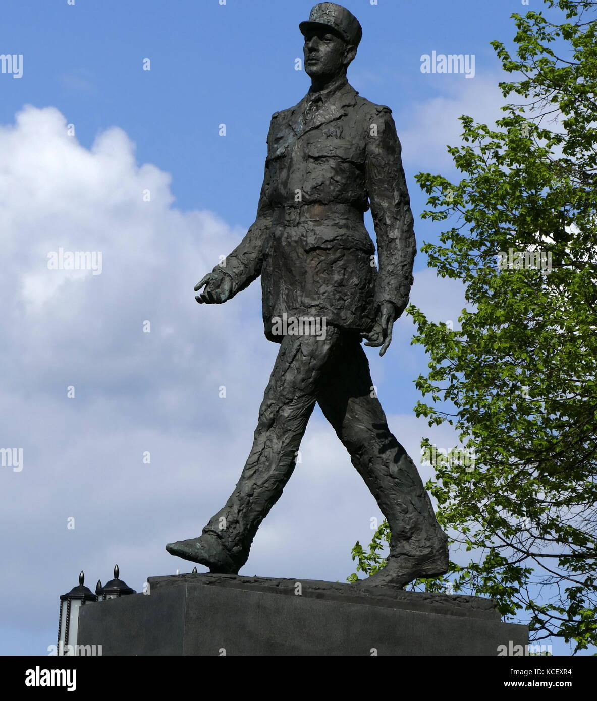 Photograph of a statue of the former President of France, Charles de Gaulle, is the subject of one of Warsaw’s more prominent monuments. Striding away from what was once the Communist party HQ, the monument is a gift from the French government. Dated 21st Century Stock Photo