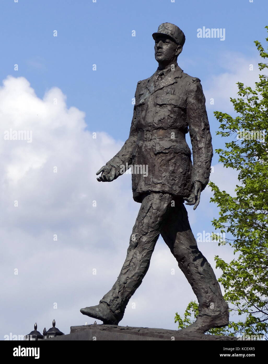 Photograph of a statue of the former President of France, Charles de Gaulle, is the subject of one of Warsaw’s more prominent monuments. Striding away from what was once the Communist party HQ, the monument is a gift from the French government. Dated 21st Century Stock Photo