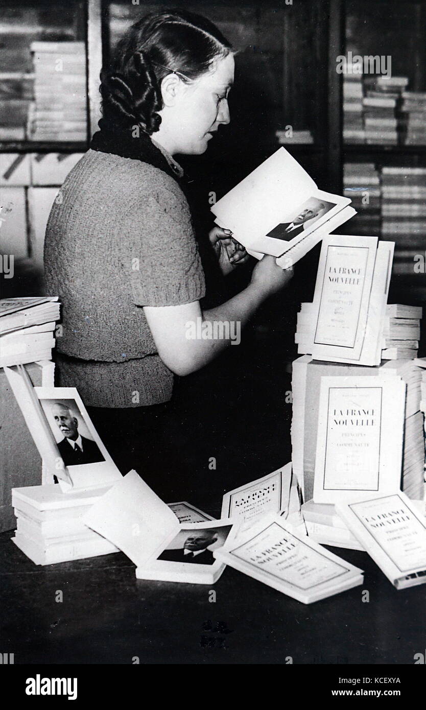 Photograph of a bookshop selling copies of 'La France nouvelle', by Marshall Phillipe Pétain. 'New France'. Principles of the community' June 1941. Marshal Petain explains to the French, the requirements of his policy and the conditions of the national recovery. This is Petain's attempt to justify collaboration with Germany during the Vichy era and German occupation of France in World War Two. Dated 20th Century Stock Photo