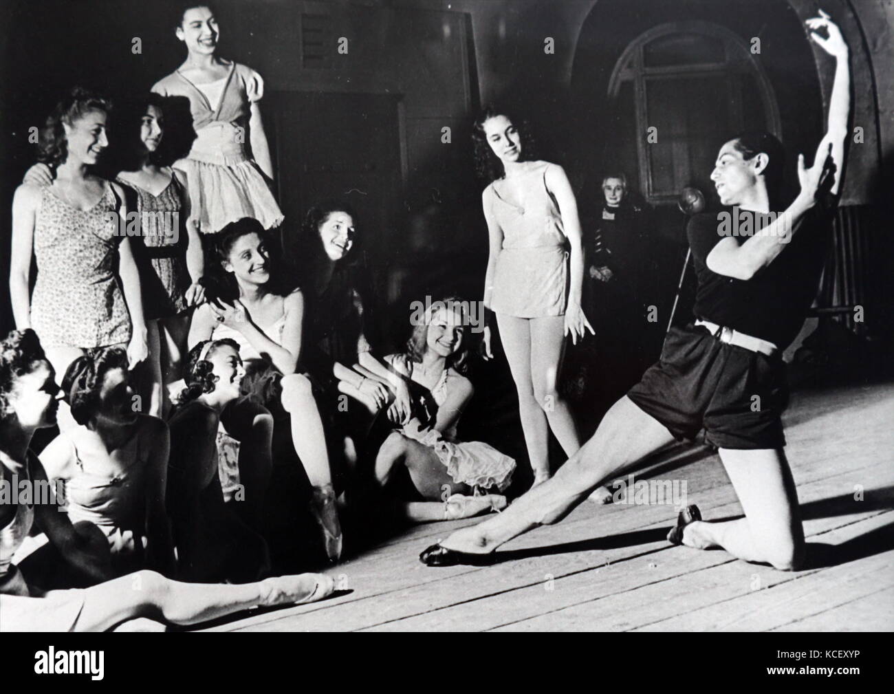 Photograph of Serge Lifar (1905 – 1986,) Master of the Paris Ballet, during practice during World War Two. Lifar was a choreographer, director, writer. Dated 20th Century Stock Photo