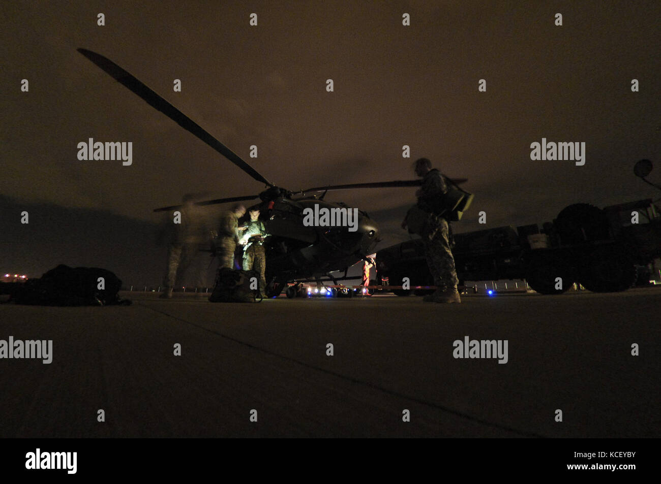 U.S. Army Cpt. Jon Strickland, Warrant Officer Eric Ponder, and Staff