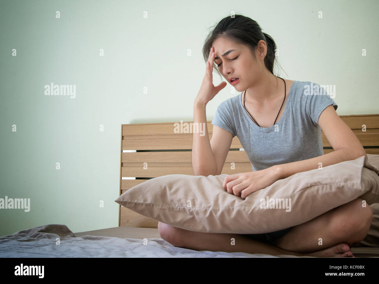 Young pregnant woman feeling unwell , suffering from morning sickness. Stock Photo