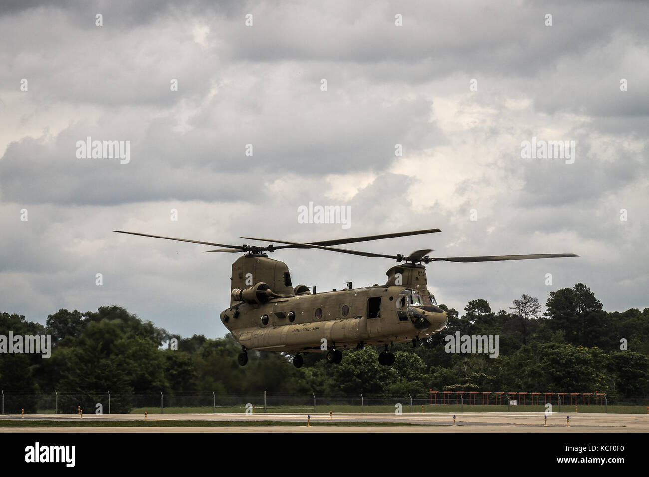 South Carolina business owners and managers with the Chamber of Commerce of Greenville visit the S.C. National Guard Army Aviation Support Facility (location 2), during an event hosted by the S.C. National Guard, South Carolina Technology and Aviation Center, Greenville, S.C., June 21, 2017. During the visit, guests and aviators discussed the value of Citizen Soldiers as elements of the (civilian) work force, with particular emphasis on aviators and their ability to manage high-pressure situations, deliver payloads to critical areas, engage enemy targets and rescue people from life-threatening Stock Photo