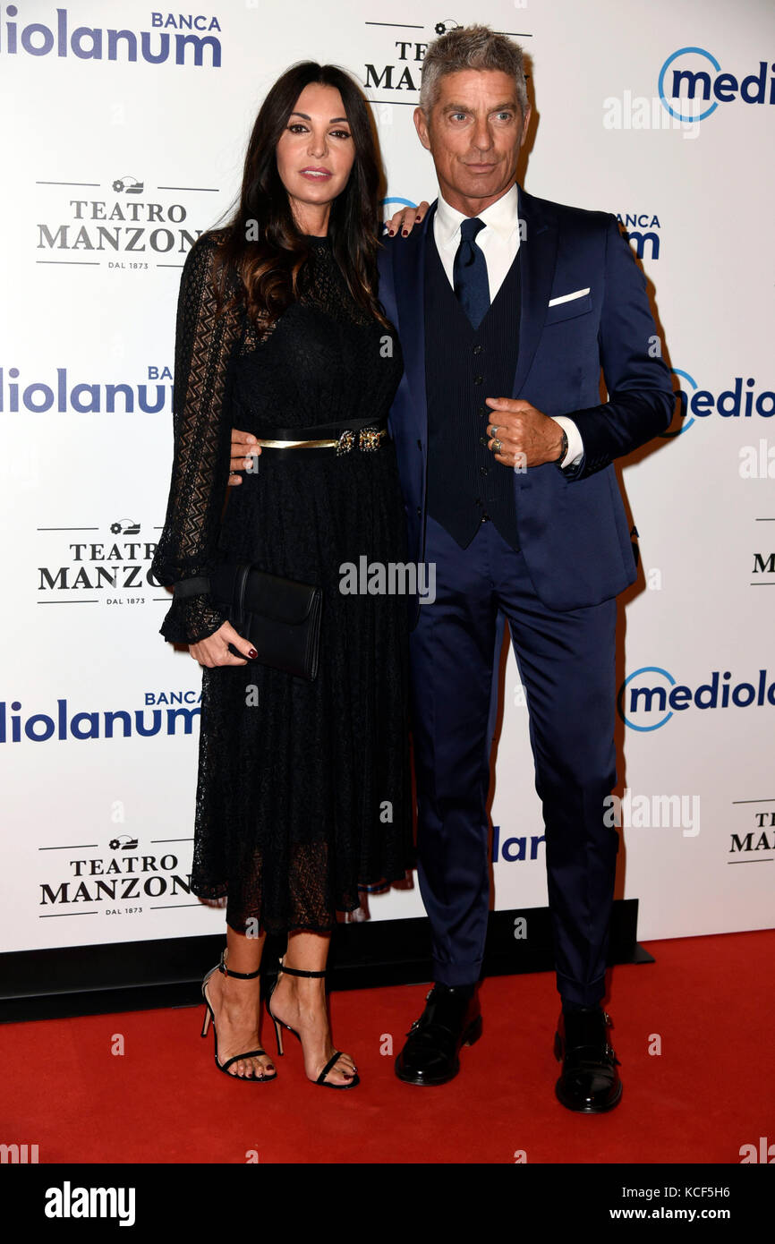 Milan, Italy. 05th Oct, 2017. Milan, Manzoni Theater - Red carpet opening season - In photo: Giorgio Restelli with his wife Credit: Independent Photo Agency/Alamy Live News Stock Photo