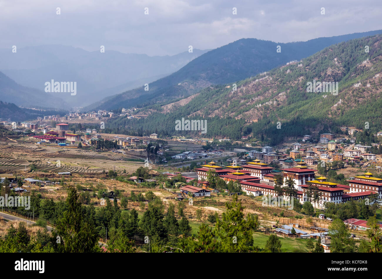 Trashi Chhoe Dzong and landscape of paddy farm villages, Thimphu, Bhutan - Trashi Chhoe Dzong, royal palace and headquarter of the monastic order. Stock Photo