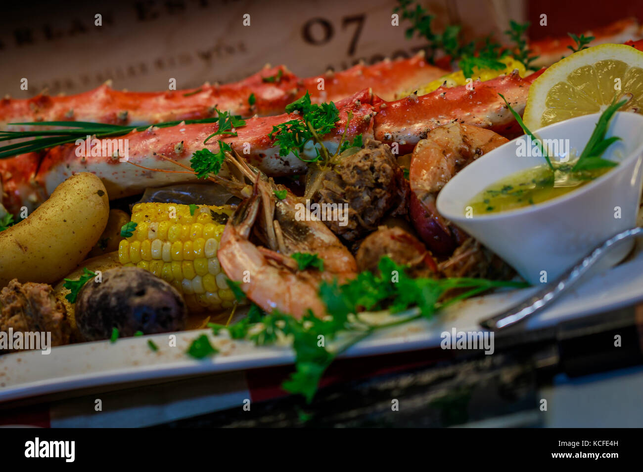 Crab fest with potatoes, corn, shrimp, sausage, and tarragon shallot