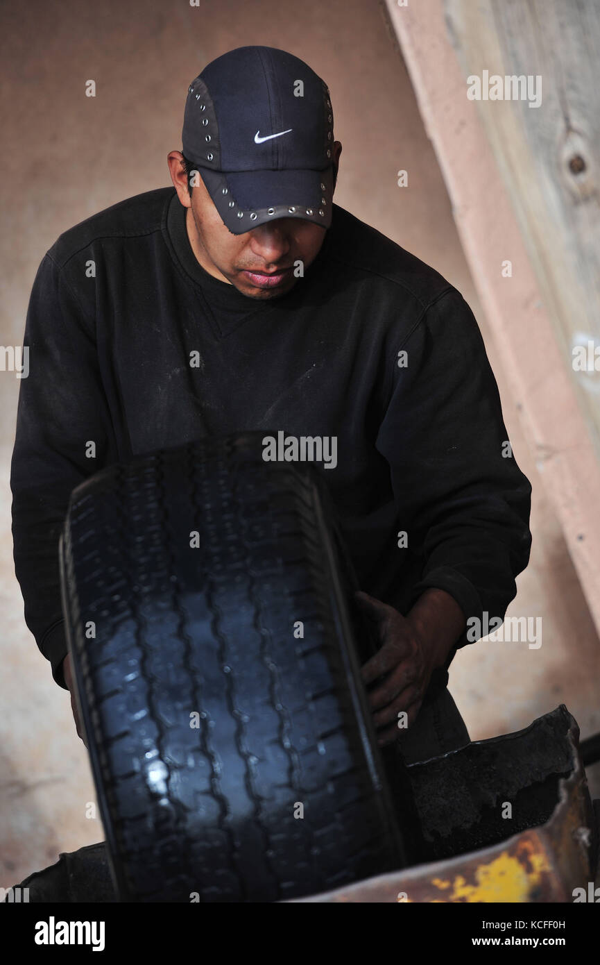 Person, man, tire Stock Photo Alamy