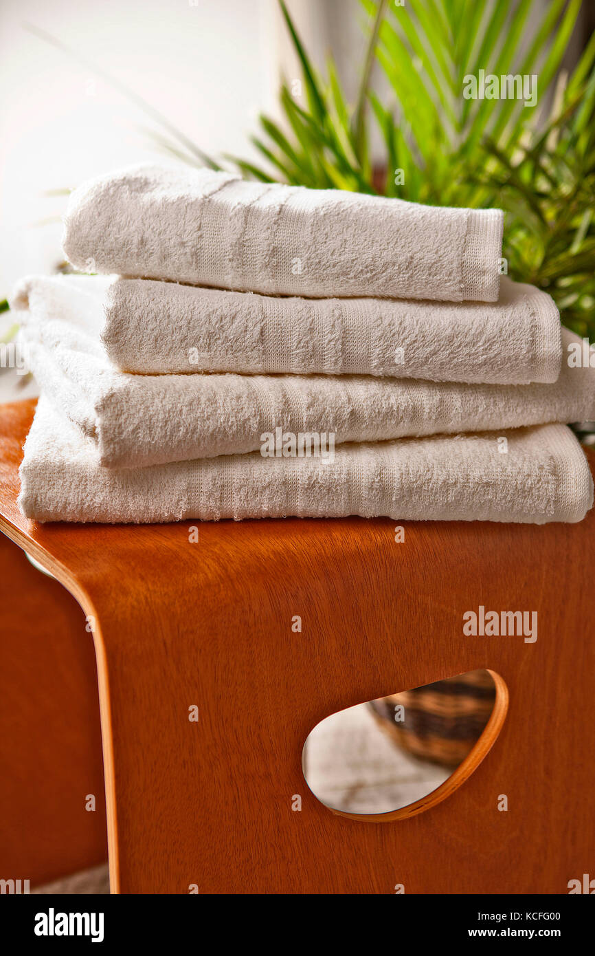 Stool, bath towels, plants, leaves Stock Photo Alamy