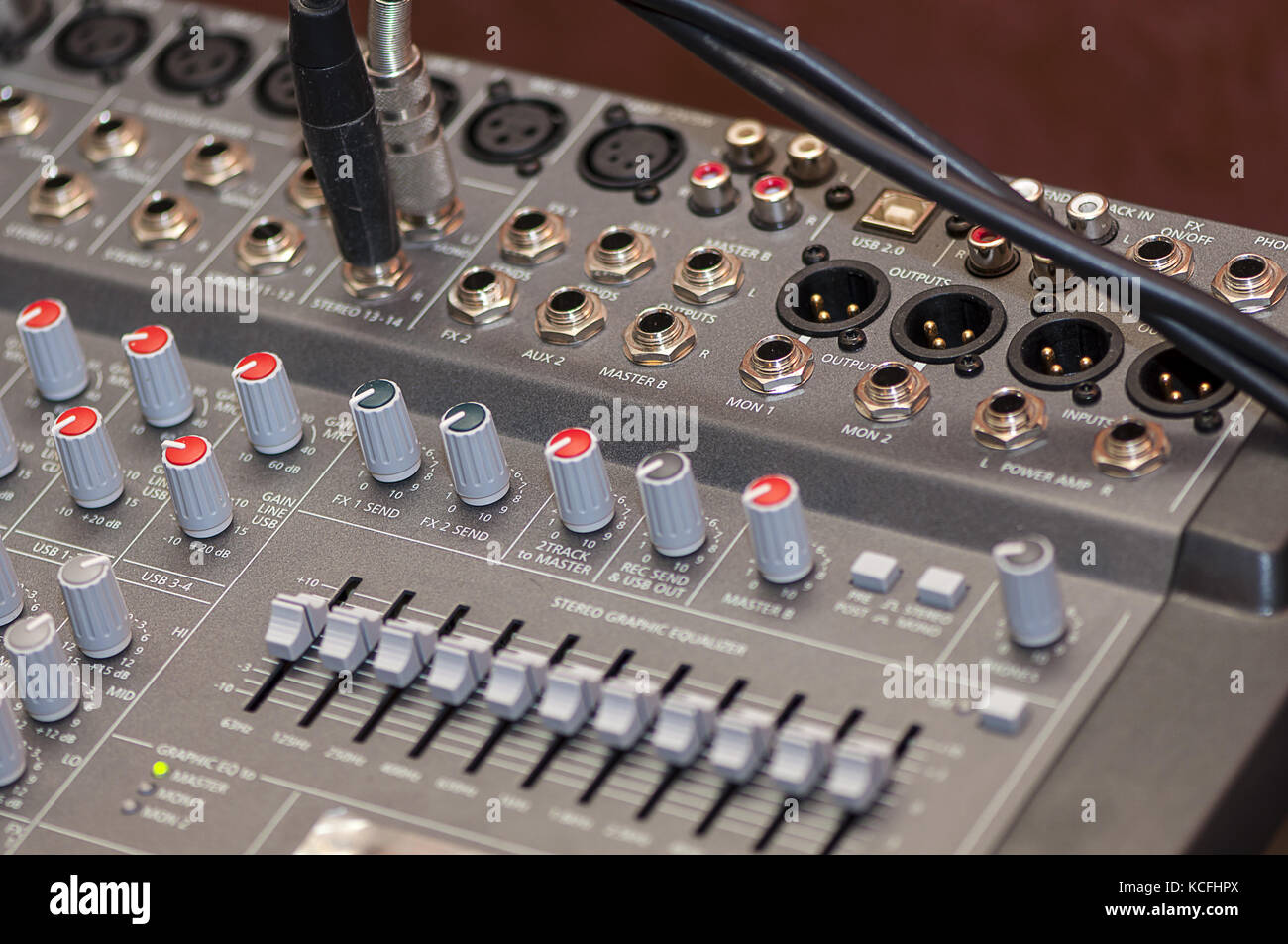 Closeup on knobs of an audio console. Digital audio board. Studio