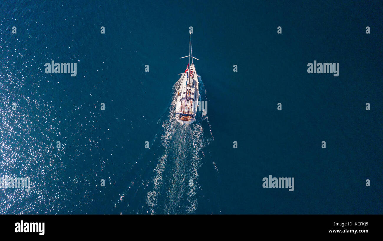 Aerial view of sailing boat on open sea. Bird eye view, water sport and ...