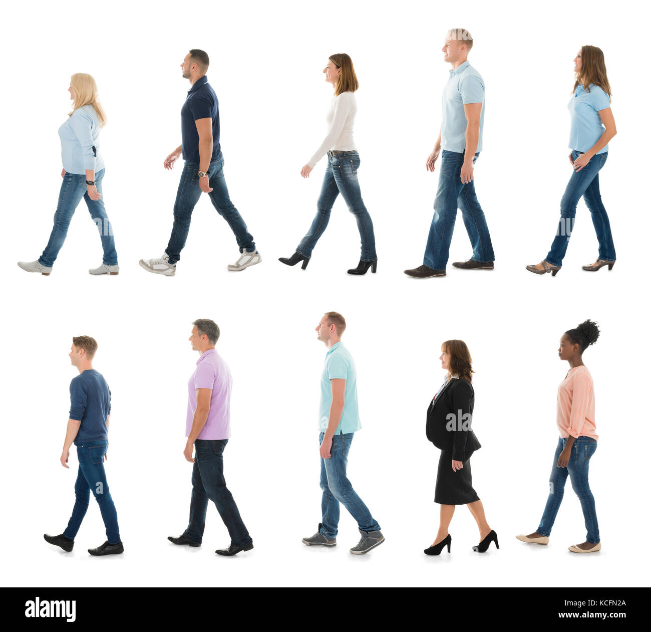 Group Of People Walking In Line Against White Background Stock Photo