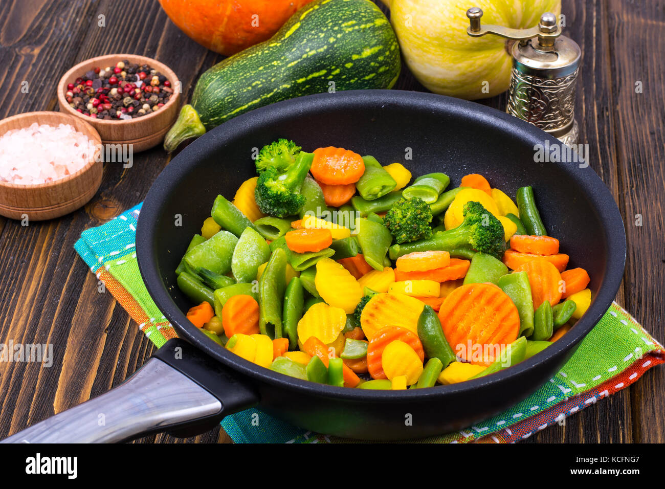 Dishes in frying pan, mix frozen vegetables Stock Photo Alamy