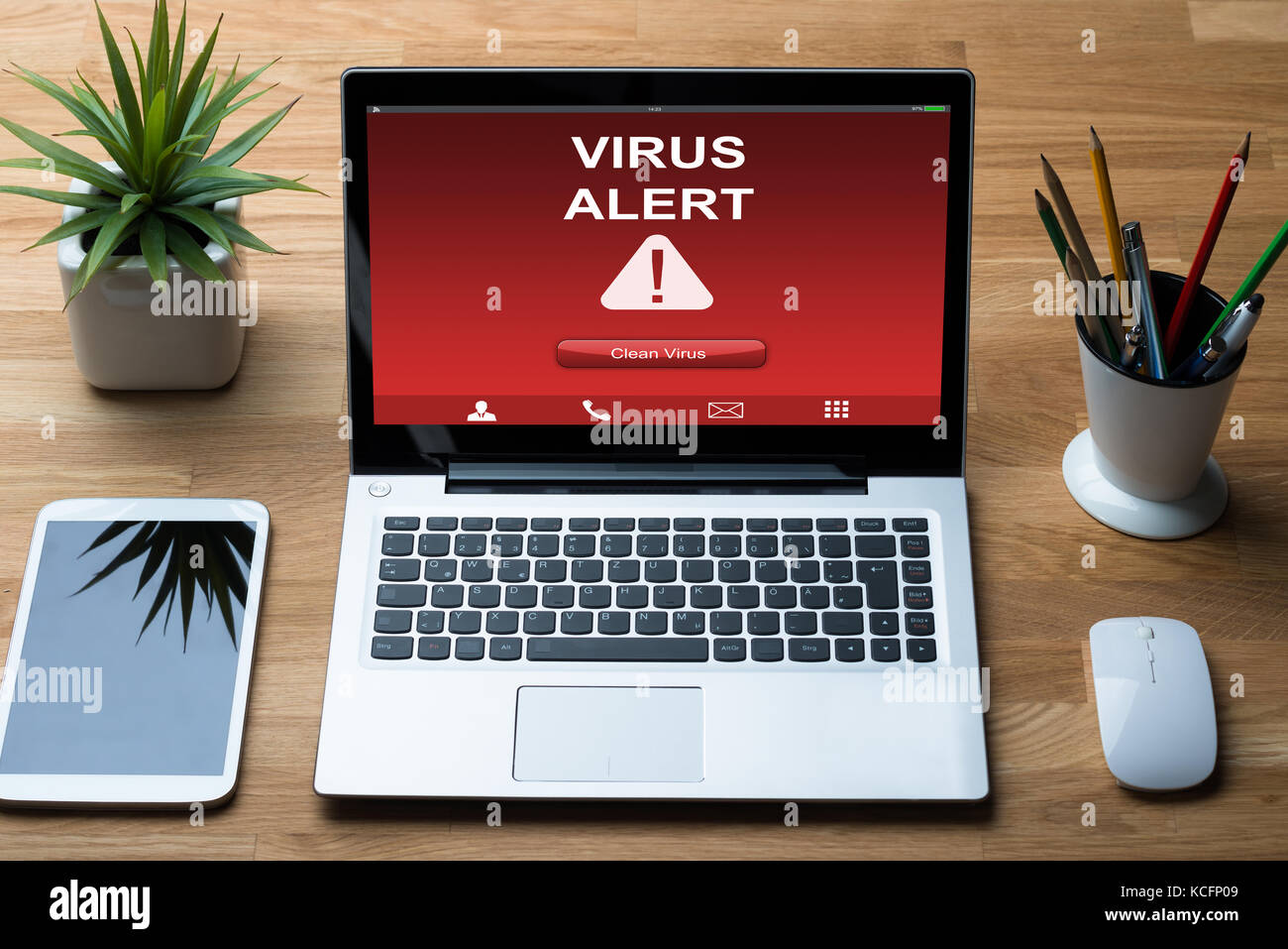 Laptop Infected By Virus With Cleaning Option At Desk Stock Photo
