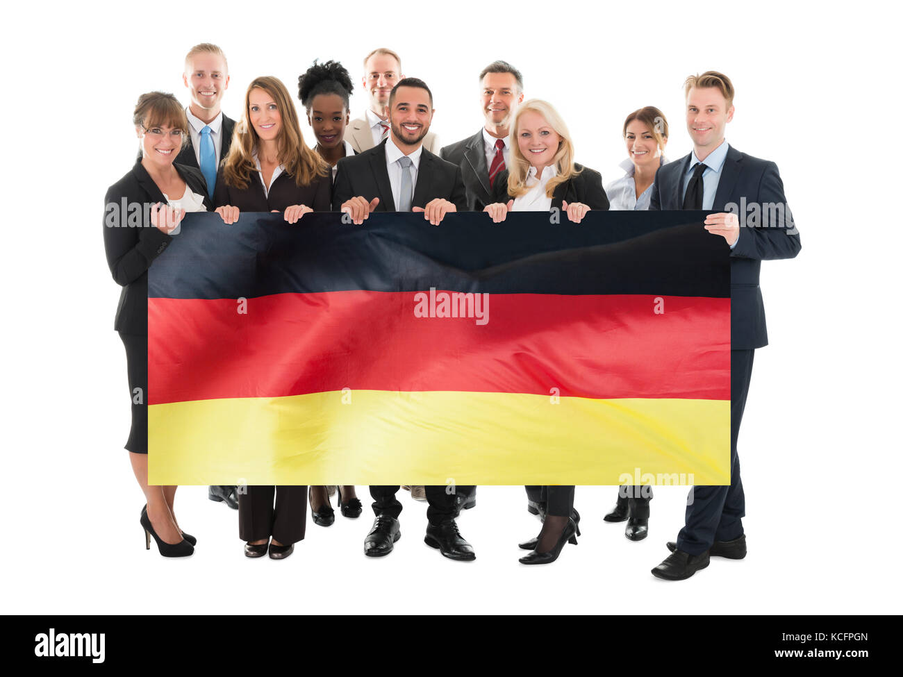Businesspeople Holding German Flag Against White Background Stock Photo
