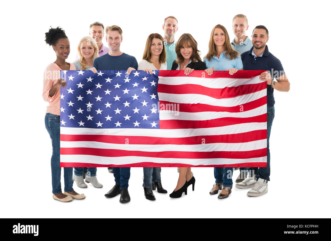 Multiethnic People Holding American Flag Against White Background Stock Photo