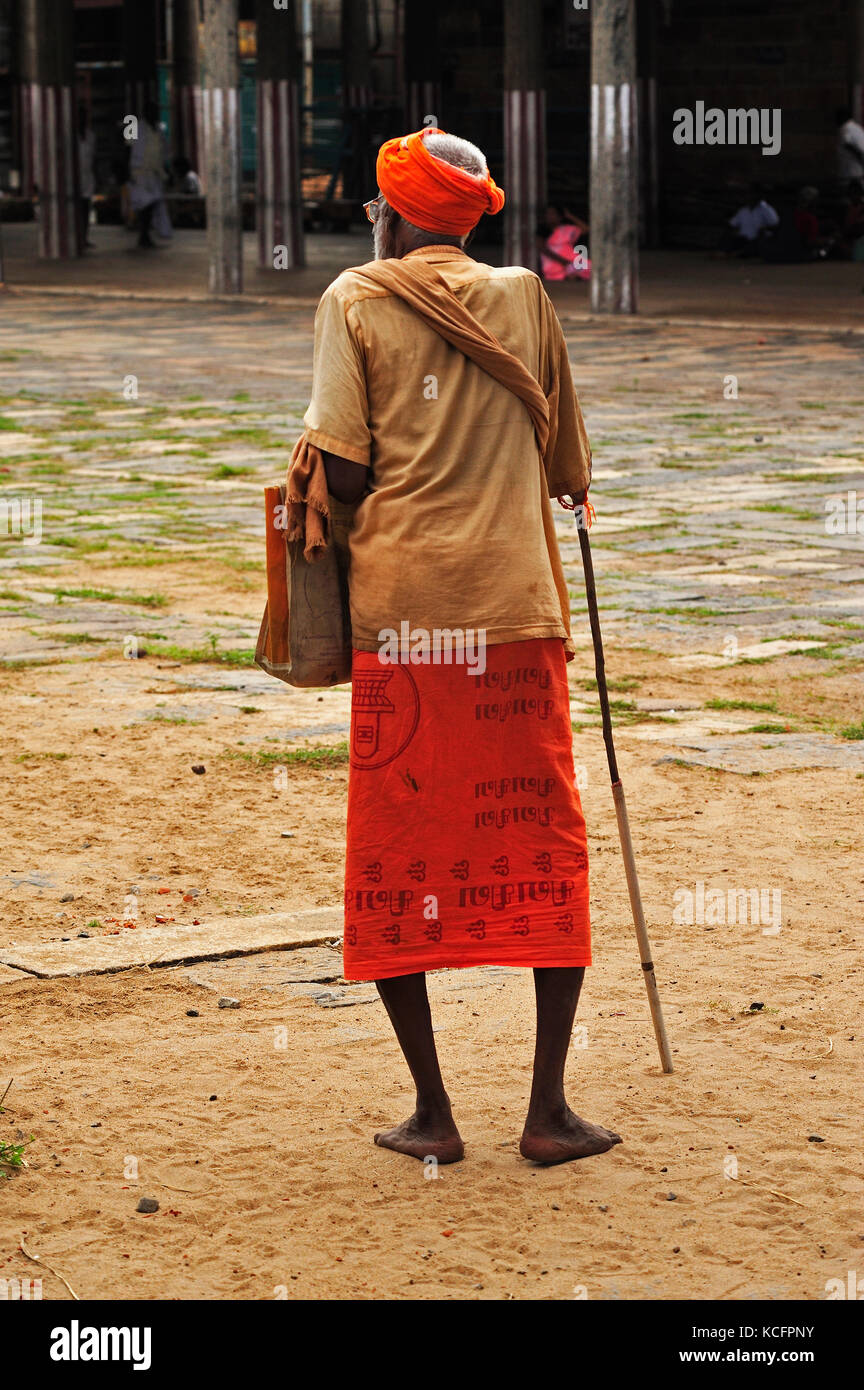 old man with walking stick, Nataraja Temple, Chidambaram, Tamil Nadu, India Stock Photo