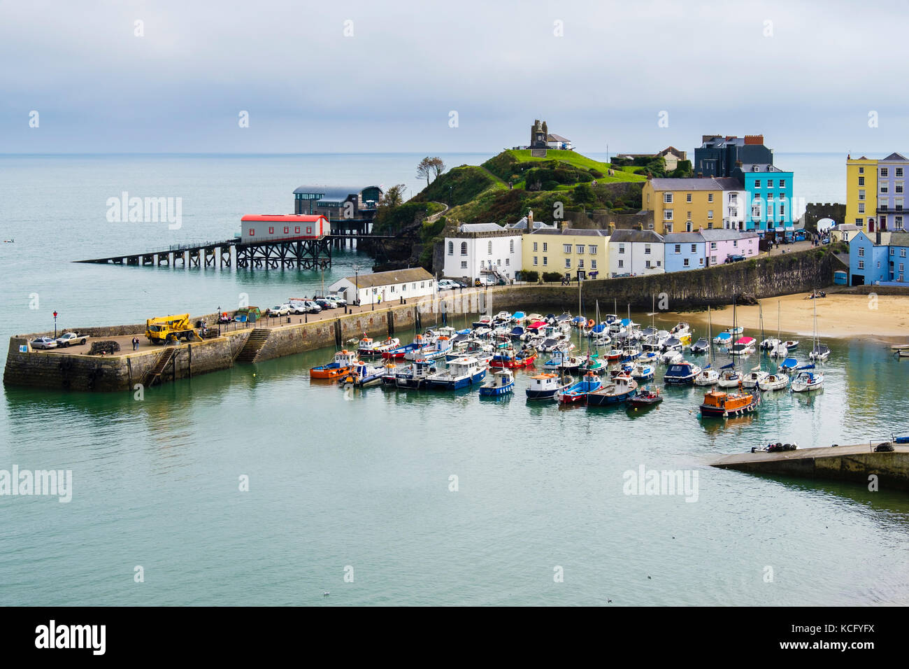 High view of old fishing harbour at high tide in Pembrokeshire Coast National Park. Tenby, Carmarthen Bay, Pembrokeshire, Wales, UK, Great Britain Stock Photo