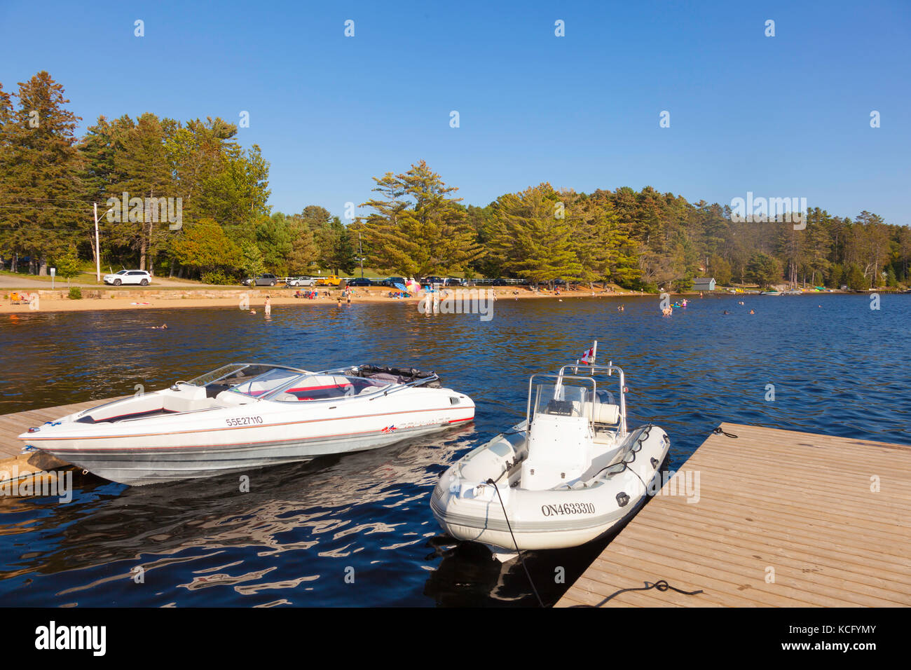 Two boats docked at Canada,Ontario,Huntsville,Dwight, Dwight Beach