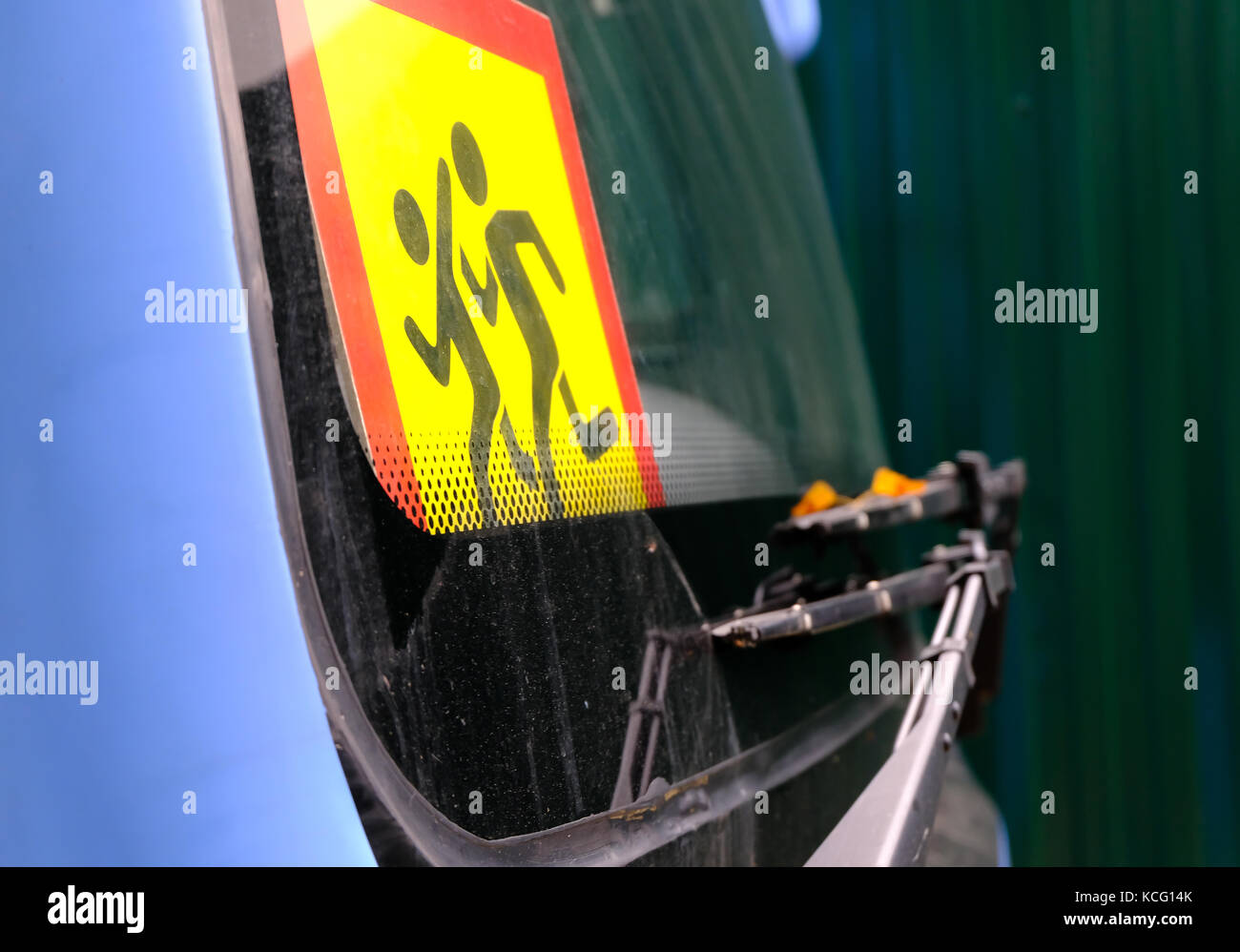 Sign 'Beware of children!' on the windshield of school or sightseeing bus. Safety when transporting schoolchildren. Stock Photo