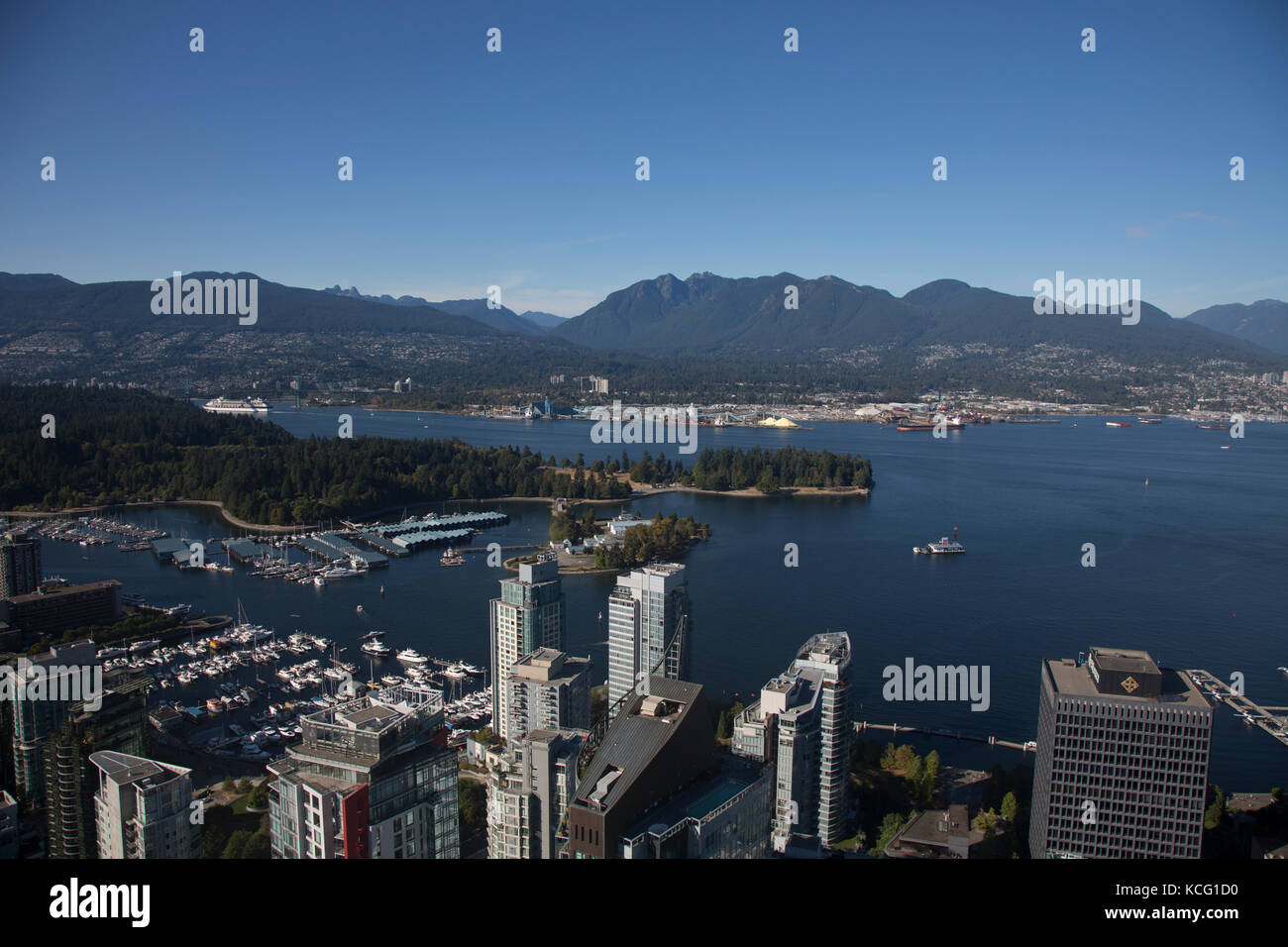 North America, Canada, British Columbia, Vancouver, high angle view of Port area of Vancouver, showing Stanley Park. City skyline with waterfront Stock Photo