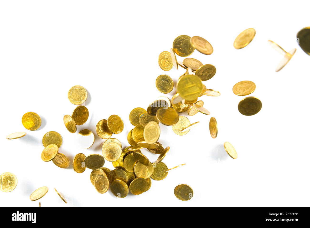 Top view of Falling gold coins money isolated on the white background ...