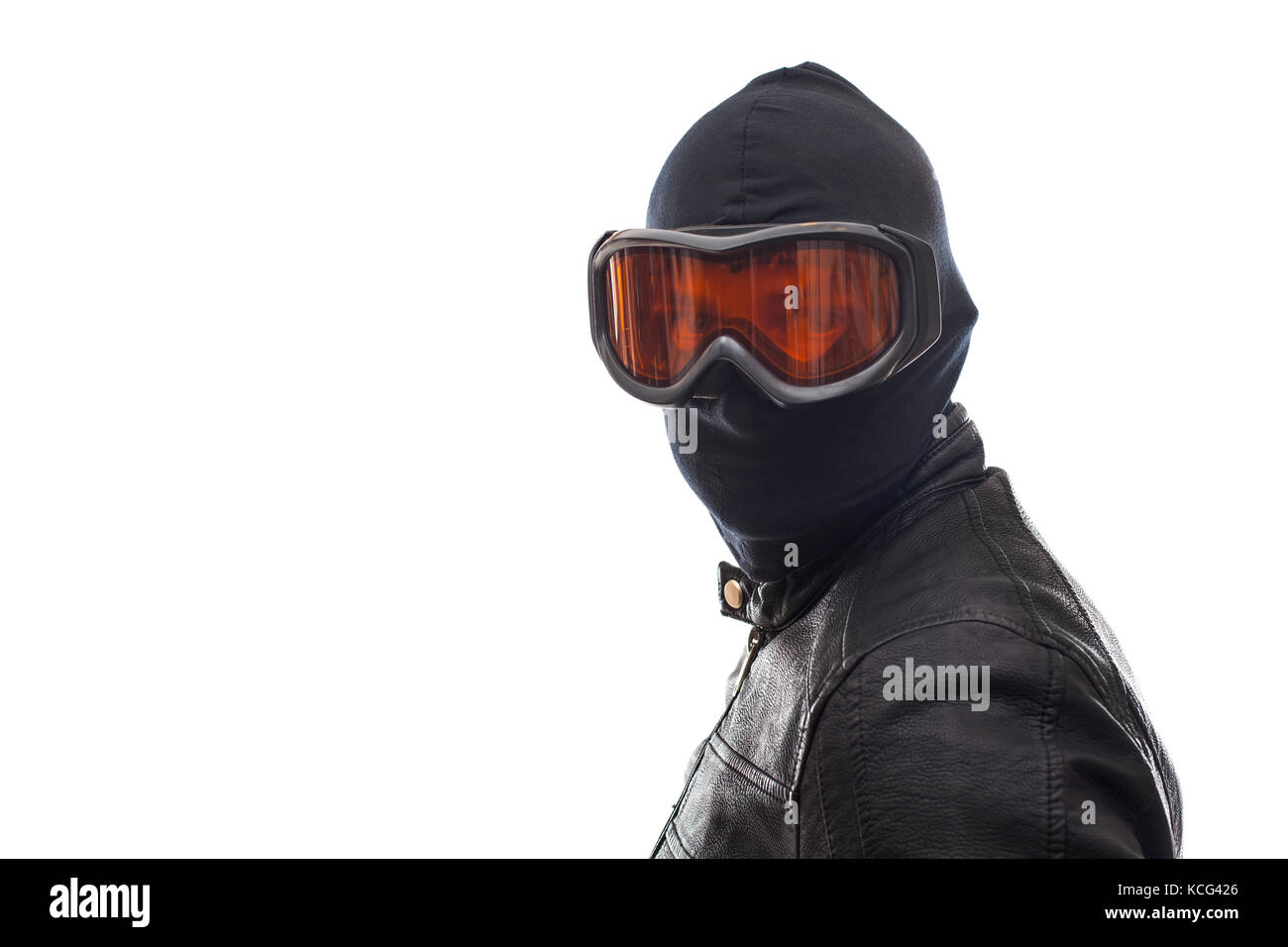 Dangerous burglar dressed in black wearing a mask on head - isolated