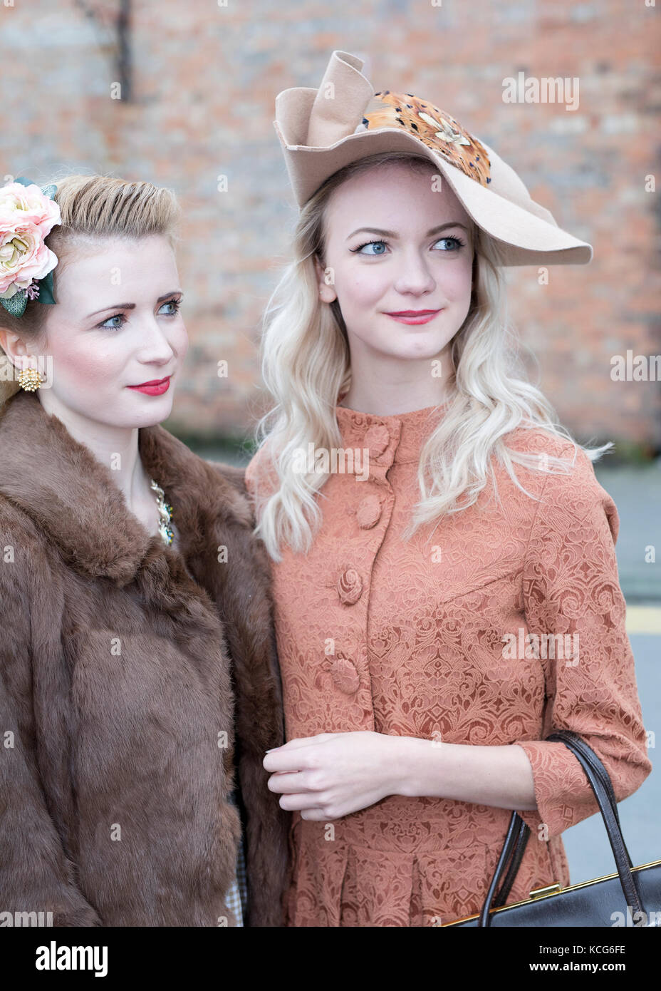 Pair of ladies dressed in 1940's vintage clothing. Welshpool 1940's weekend, October, 2017 Stock Photo